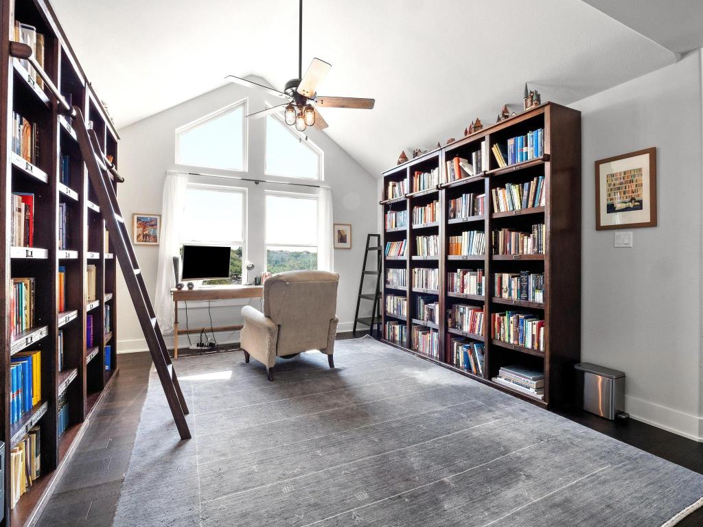 10103 Twin Lake Loop Dripping Springs, TX 78620 - Photo 2 of 32 Office space or 2nd living room upstair, a ceiling fan, healthy amount of natural light, baseboards, and high vaulted ceiling