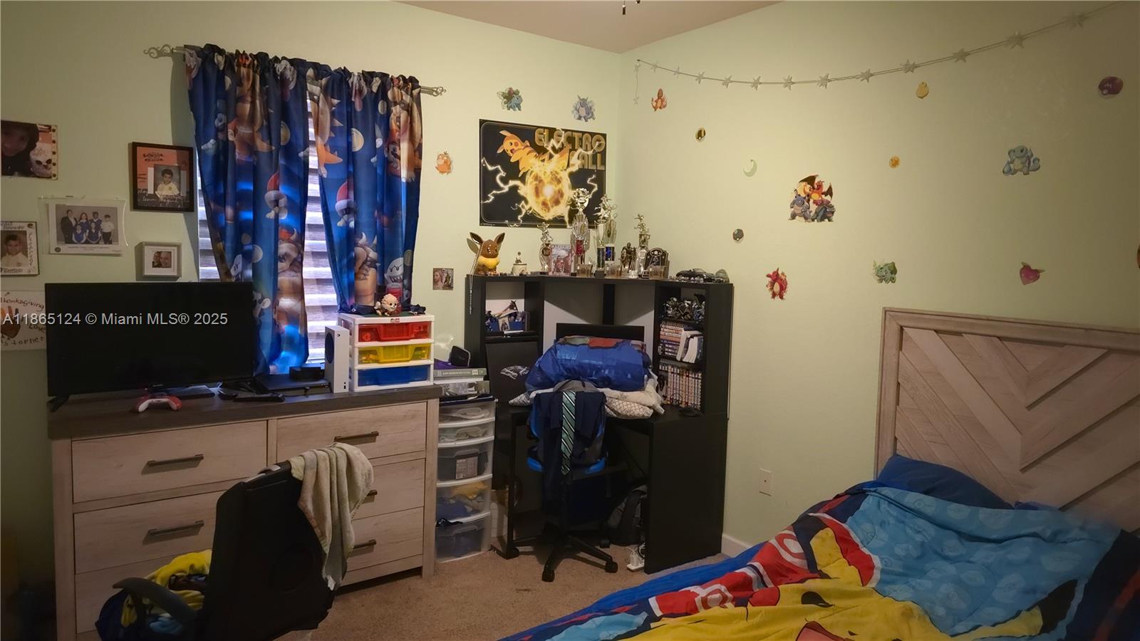 23900 Southwest 117th Court Homestead, FL 33032 - Photo 15 of 24 a room with furniture and a fan