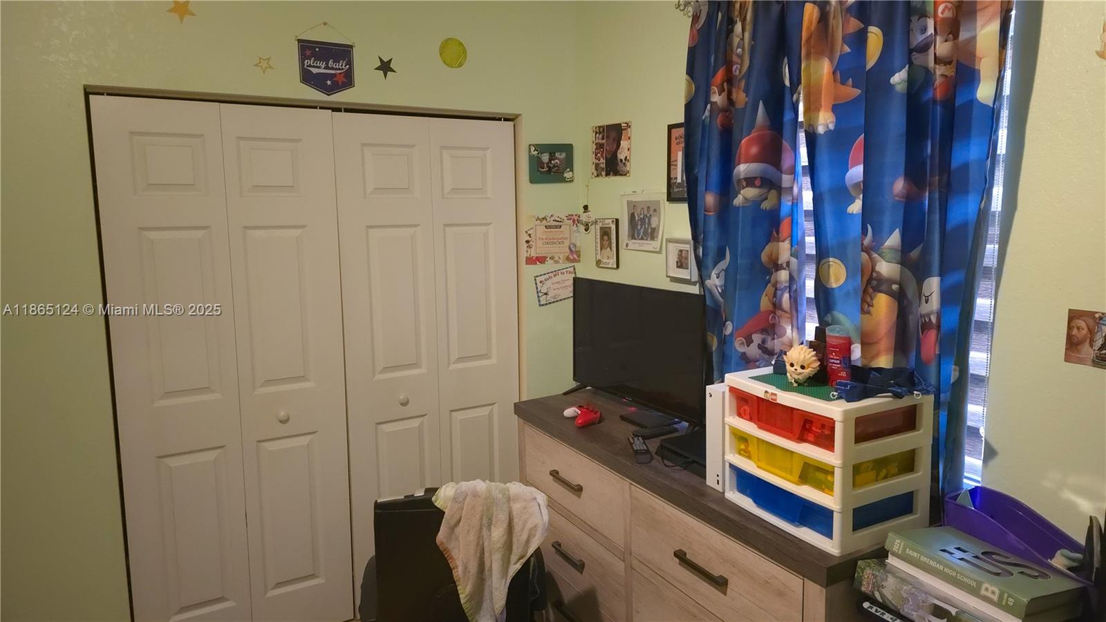 23900 Southwest 117th Court Homestead, FL 33032 - Photo 16 of 24 a room with furniture and wall paintings