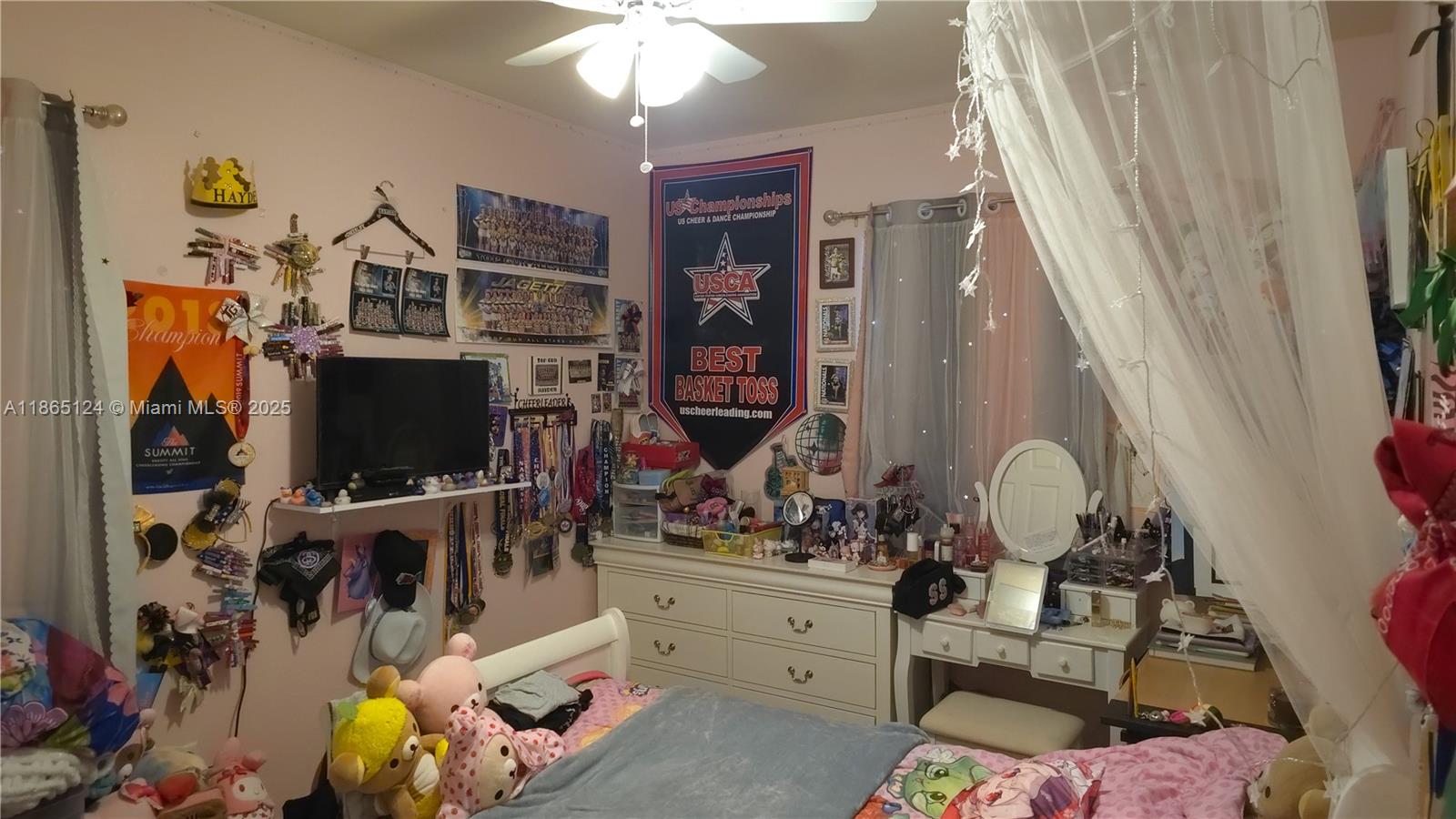 23900 Southwest 117th Court Homestead, FL 33032 - Photo 17 of 24 a living room with furniture and a flat screen tv