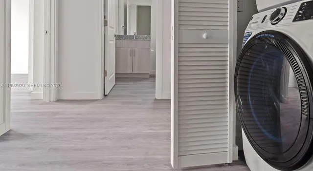 a utility room with dryer and washer