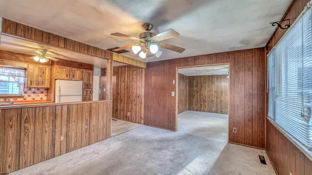a view of a hallway with a chandelier