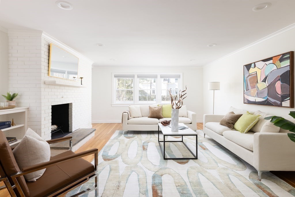 34 Fairbanks Road Lexington, MA 02421 - Photo 11 of 36 a living room with furniture and a fireplace