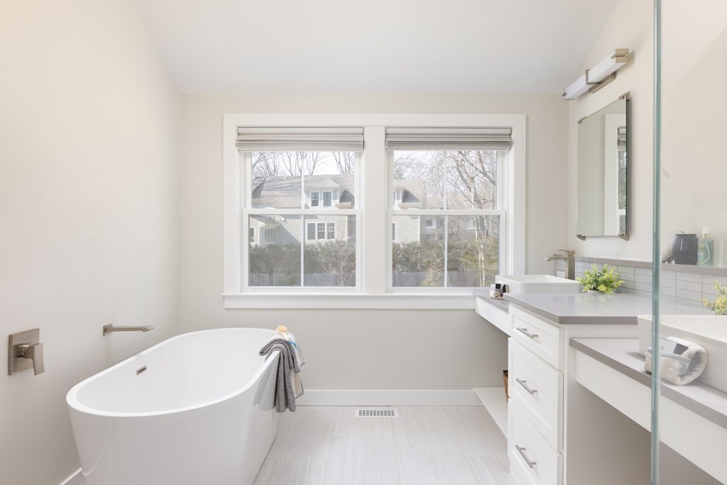 34 Fairbanks Road Lexington, MA 02421 - Photo 15 of 36 a white bath tub sitting next to a white sink