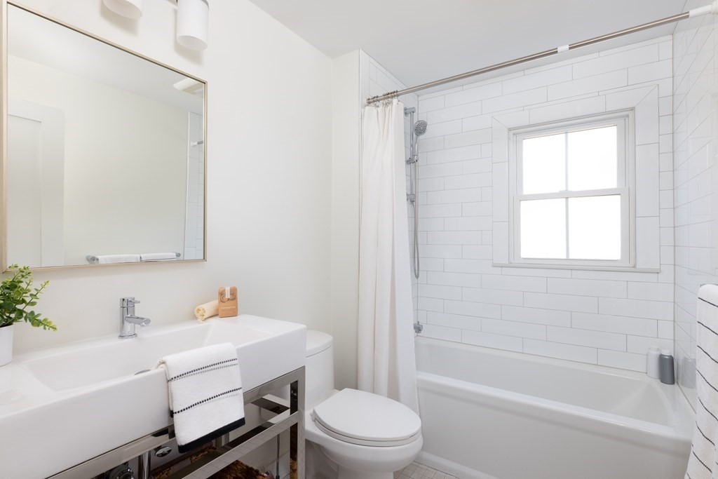34 Fairbanks Road Lexington, MA 02421 - Photo 16 of 36 a bathroom with a sink toilet and shower
