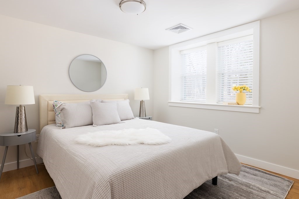 34 Fairbanks Road Lexington, MA 02421 - Photo 22 of 36 a bedroom with a bed and a window