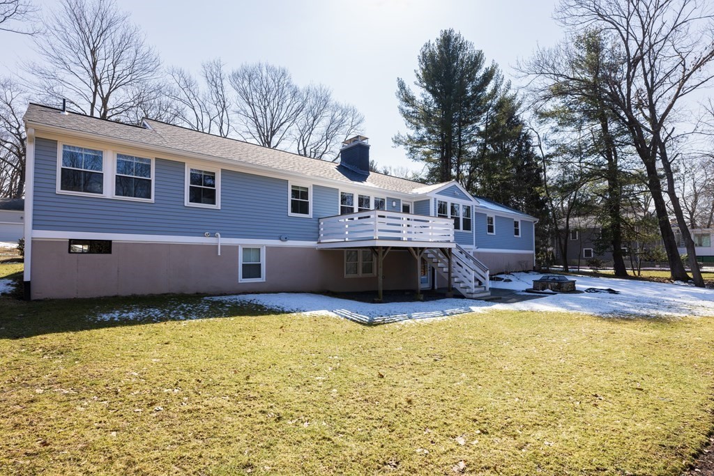 34 Fairbanks Road Lexington, MA 02421 - Photo 29 of 36 a view of a house with a yard and roof