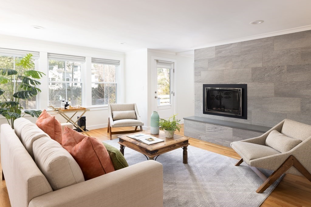 34 Fairbanks Road Lexington, MA 02421 - Photo 7 of 36 a living room with furniture and a fireplace