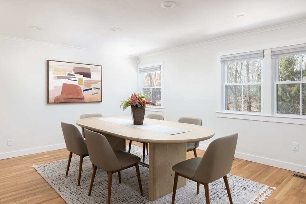 34 Fairbanks Road Lexington, MA 02421 - Photo 8 of 36 a view of a dining room with furniture and wooden floor