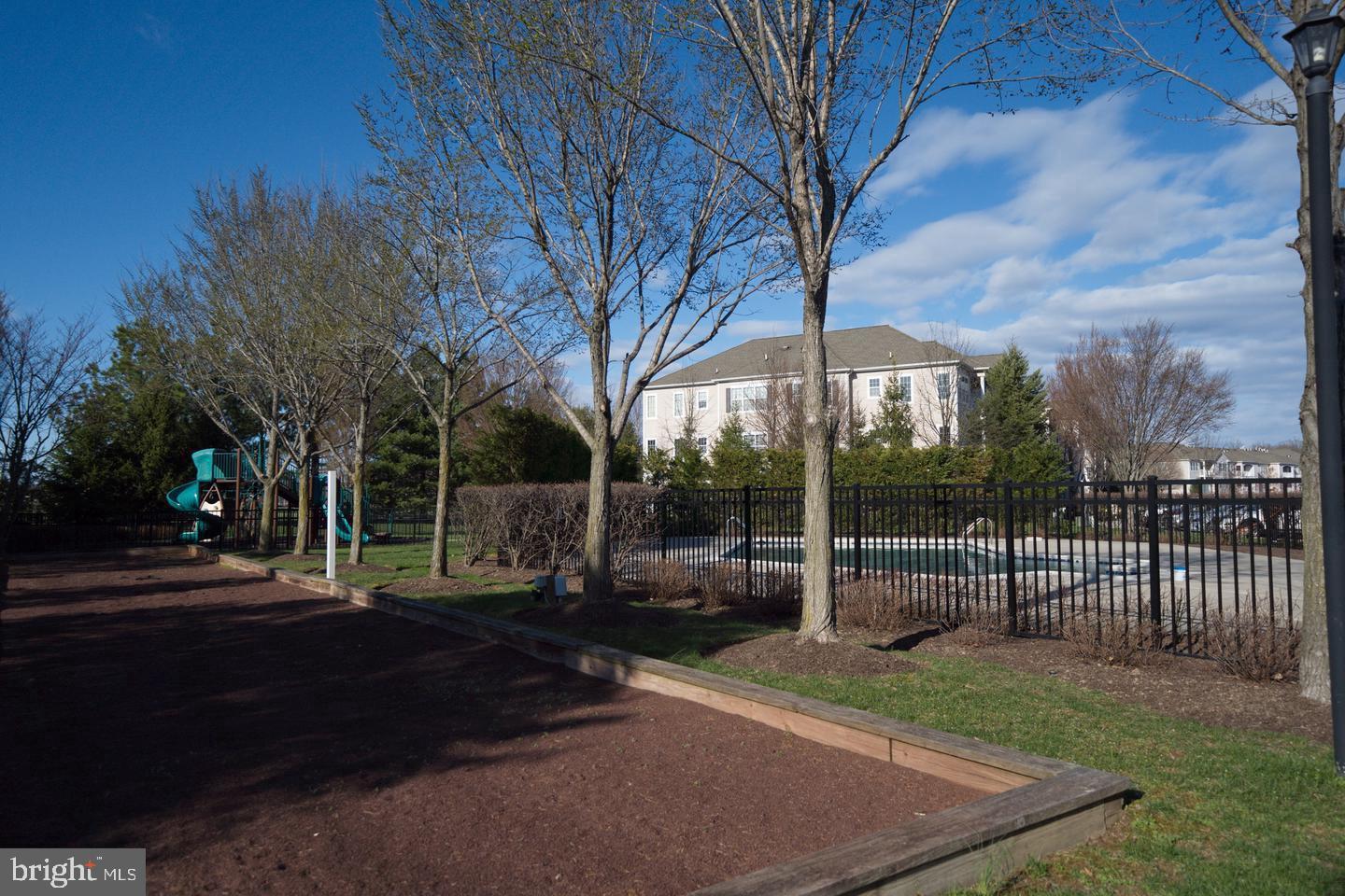1028 Timberlake Drive Ewing, NJ 08618 - Photo 7 of 10 a view of a park with iron fence