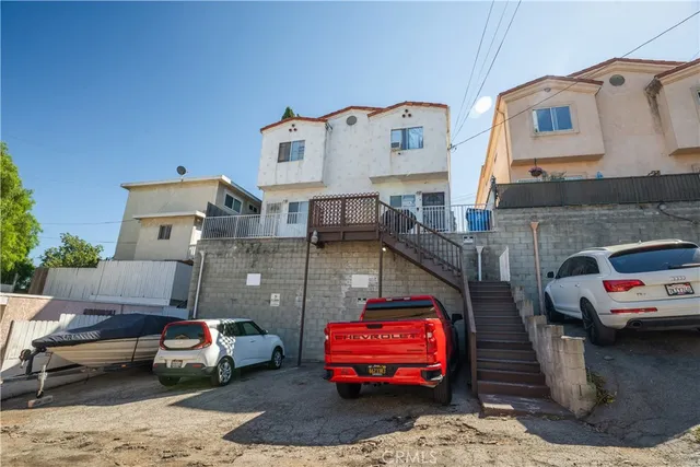 a car parked in front of a house