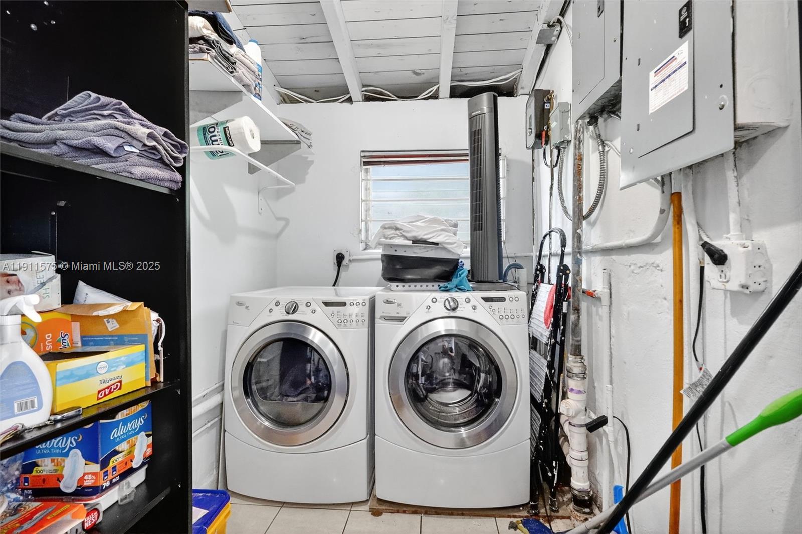765 Northwest 46th Street Miami, FL 33127 - Photo 20 of 40 a utility room with dryer and washer