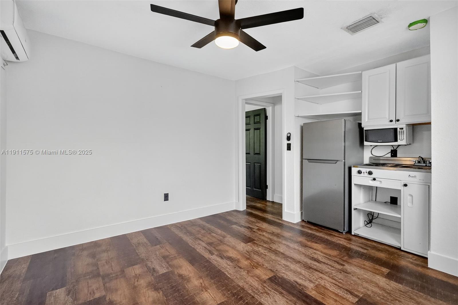 765 Northwest 46th Street Miami, FL 33127 - Photo 21 of 40 a view of a kitchen with electric appliances