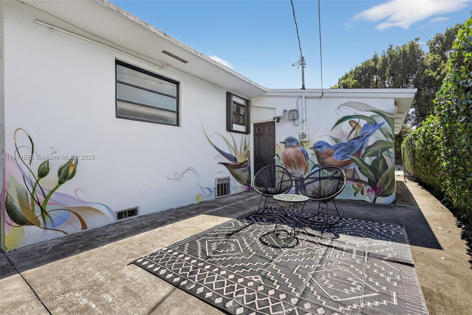 765 Northwest 46th Street Miami, FL 33127 - Photo 33 of 40 a view of a entryway door of the house