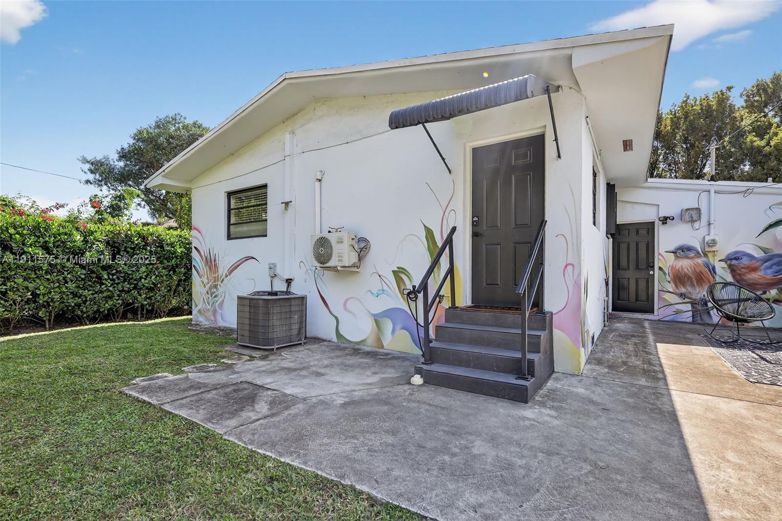 765 Northwest 46th Street Miami, FL 33127 - Photo 34 of 40 a view of a back yard of the house