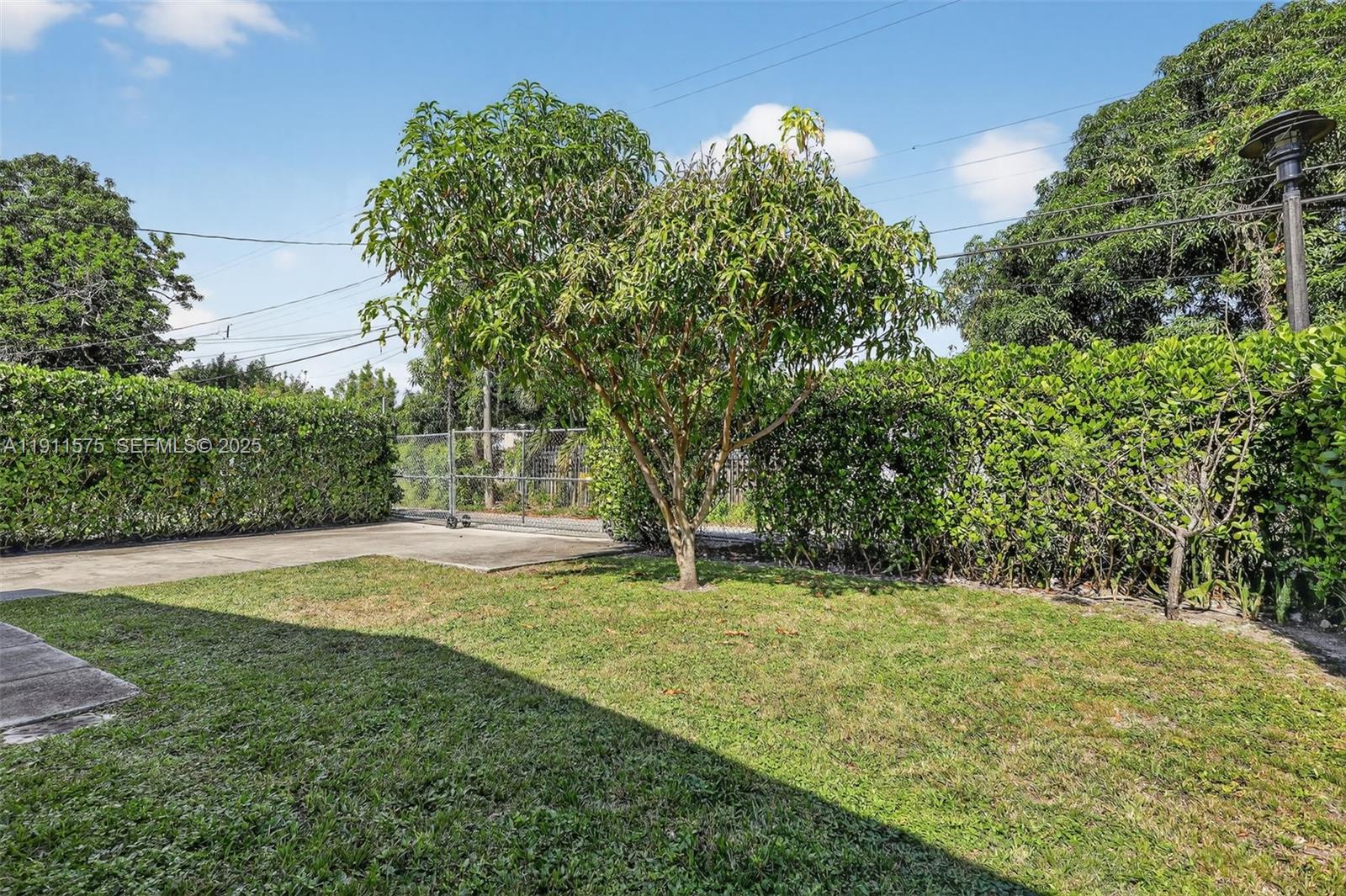 765 Northwest 46th Street Miami, FL 33127 - Photo 36 of 40 a view of an outdoor space and yard