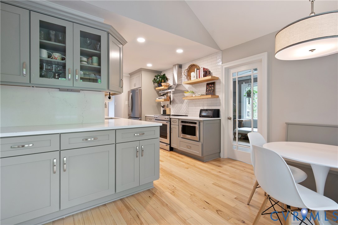 3111 Middlewood Road Midlothian, VA 23113 - Photo 14 of 45 Modern kitchen featuring light gray cabinetry, gla