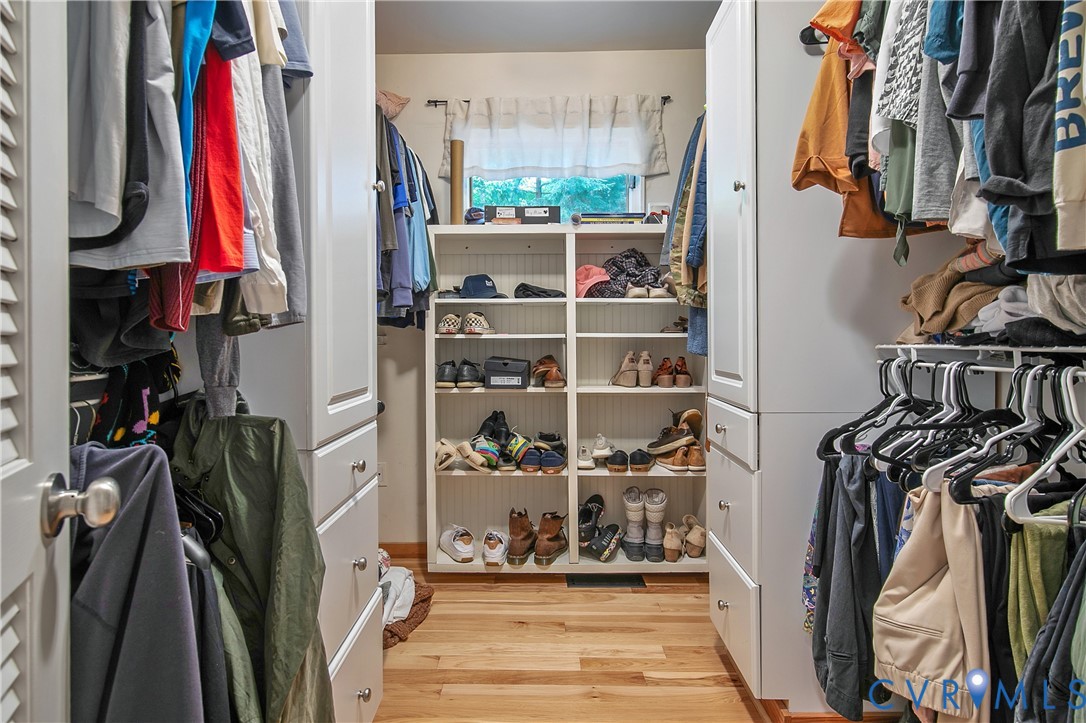 3111 Middlewood Road Midlothian, VA 23113 - Photo 21 of 45 Walk-in closet featuring wood-finish flooring, bui