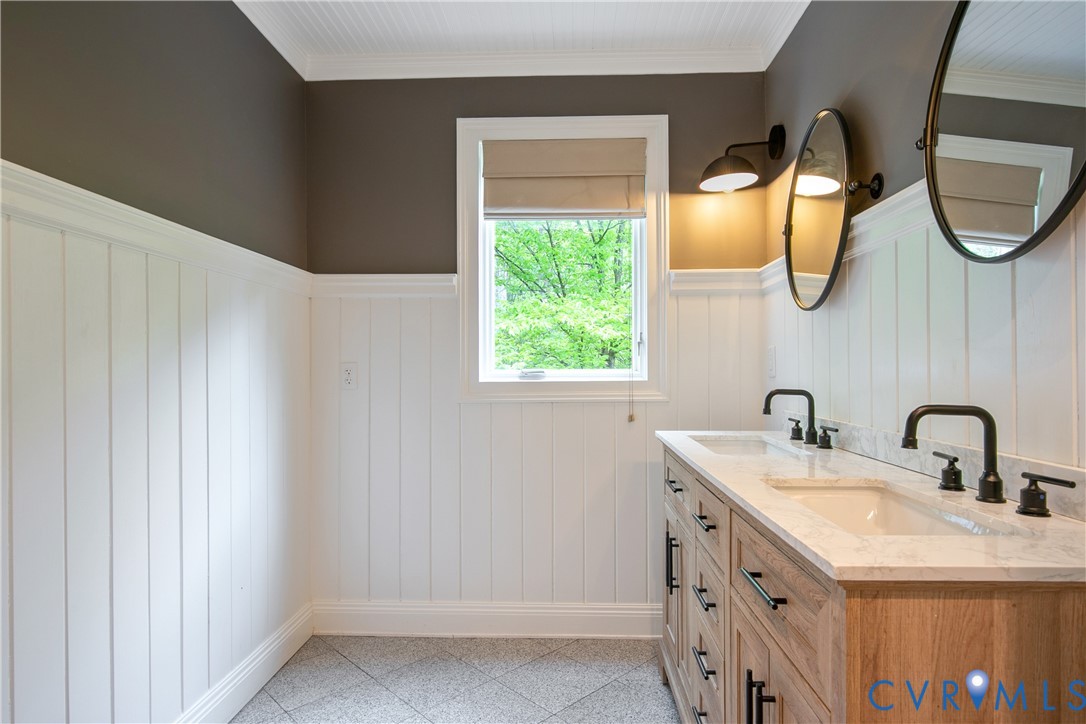 3111 Middlewood Road Midlothian, VA 23113 - Photo 23 of 45 Double vanity featuring undermount sinks, stone co