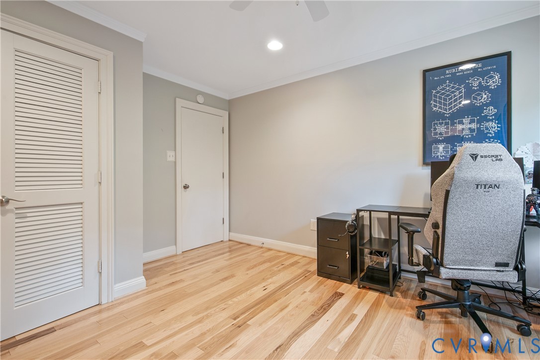 3111 Middlewood Road Midlothian, VA 23113 - Photo 27 of 45 Wood-finish flooring throughout, featuring a louve