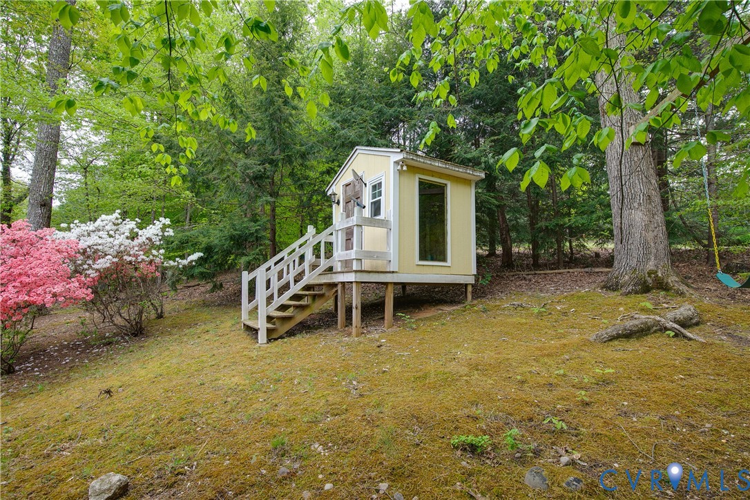 3111 Middlewood Road Midlothian, VA 23113 - Photo 36 of 45 Elevated yellow accessory structure with white rai