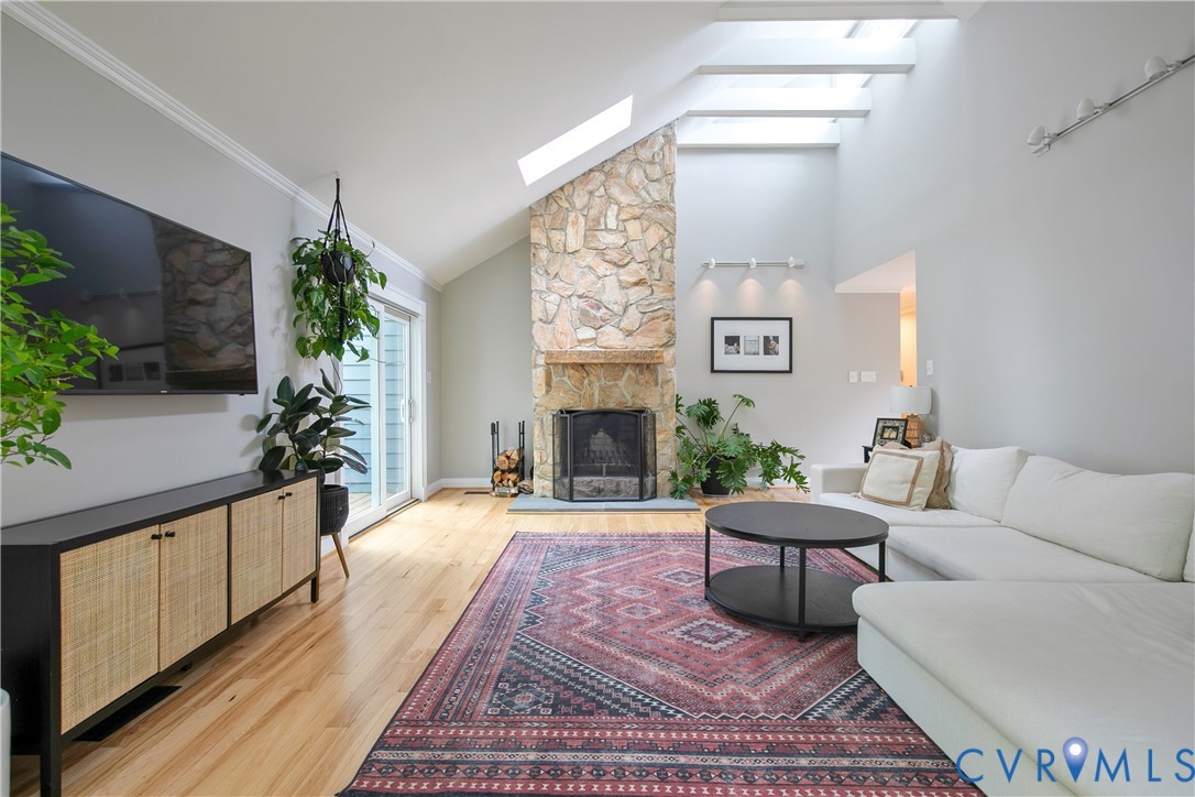 3111 Middlewood Road Midlothian, VA 23113 - Photo 4 of 45 Vaulted ceilings with skylights, a stone-front fir
