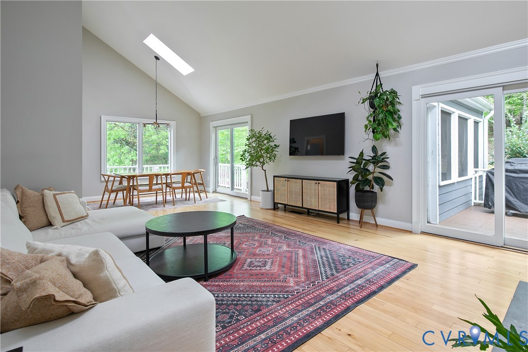 3111 Middlewood Road Midlothian, VA 23113 - Photo 7 of 45 Vaulted ceiling living area featuring wood-finish