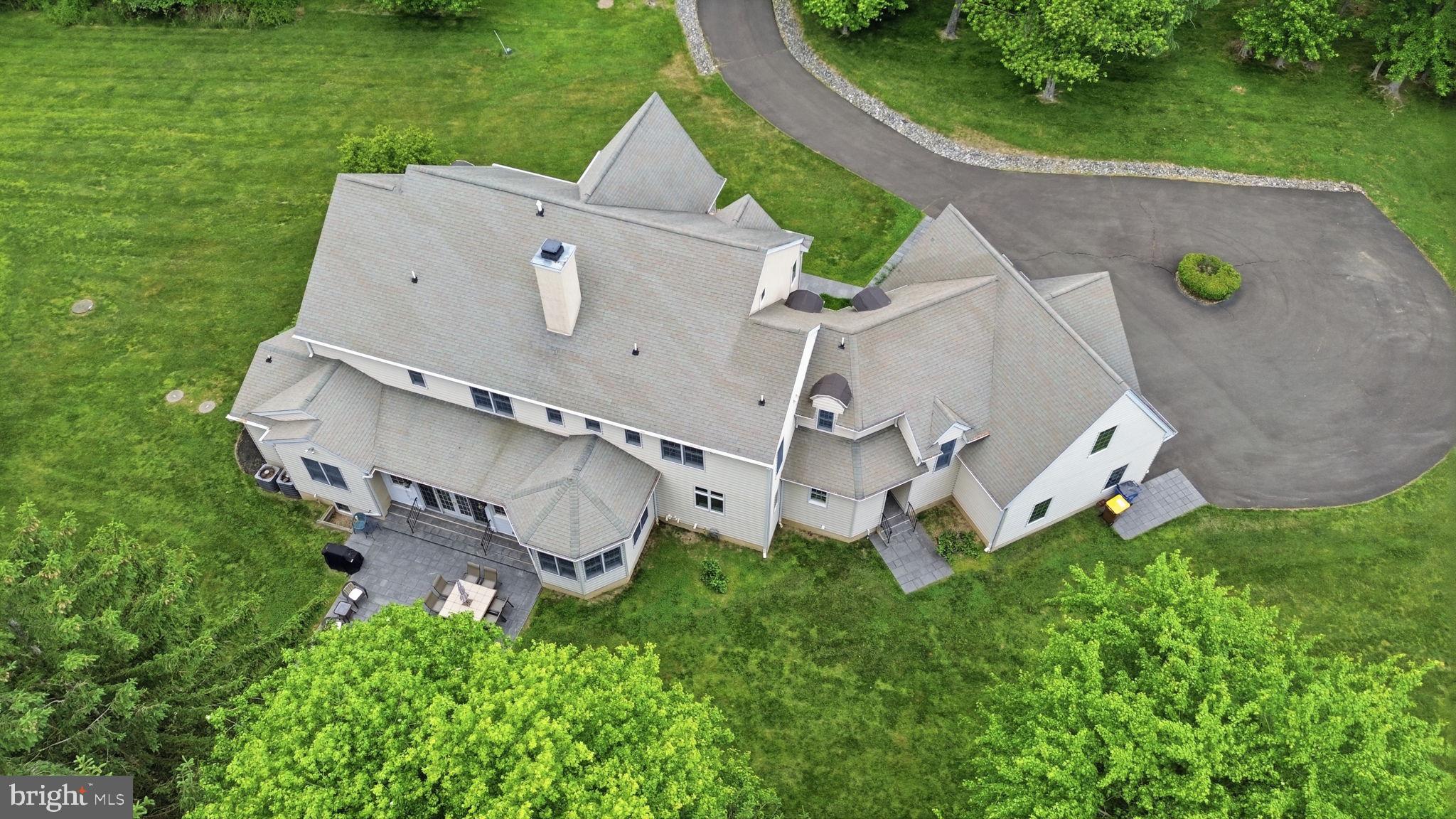1588 Wrightstown Road Newtown, PA 18940 - Photo 79 of 81 an aerial view of a house with a garden