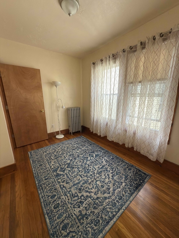 3965 Washington Street Boston, MA 02131 - Photo 7 of 18 a view of an empty room and window