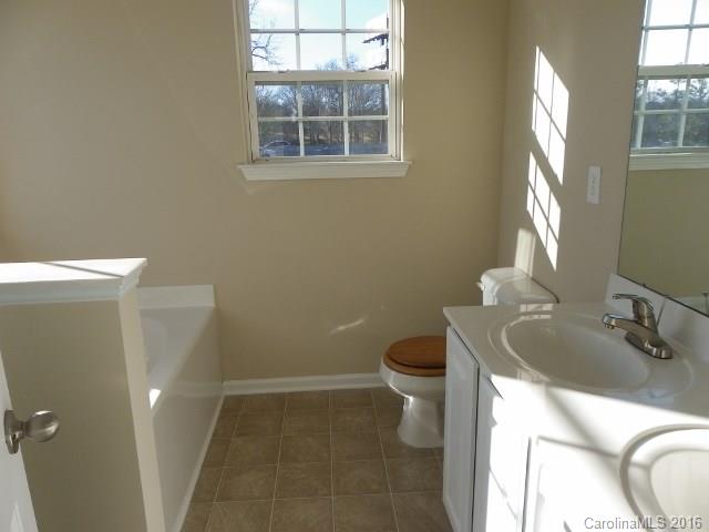 720 Jones Branch Road Fort Mill, SC 29715 - Photo 7 of 12 a bathroom with a sink and toilet