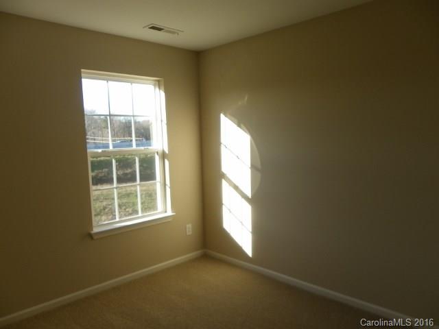 720 Jones Branch Road Fort Mill, SC 29715 - Photo 9 of 12 an empty room with a window