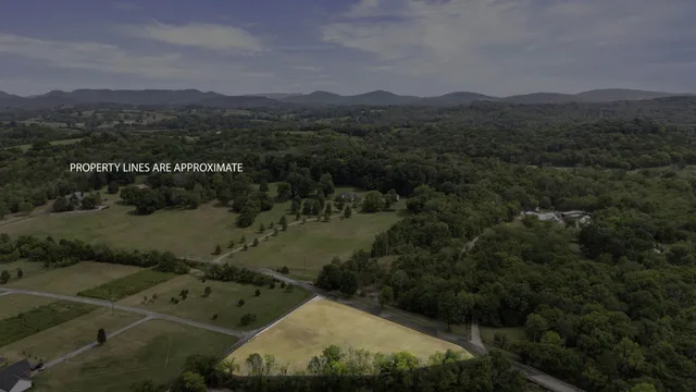 a view of a swimming pool with an outdoor space