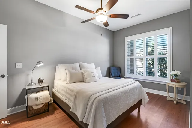 a outdoor living room with furniture and a window