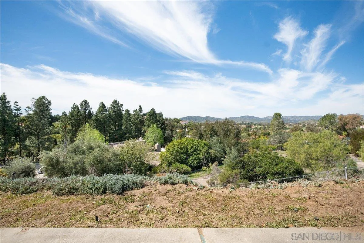 17526 St Andrews Drive Poway, CA 92064 - Photo 1 of 55 a view of a dry yard with green space