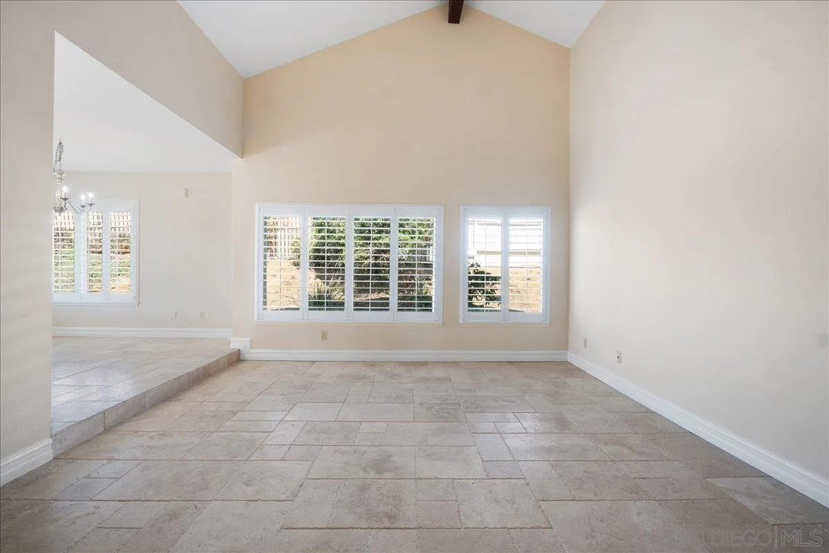 17526 St Andrews Drive Poway, CA 92064 - Photo 15 of 55 a view of an empty room with a window