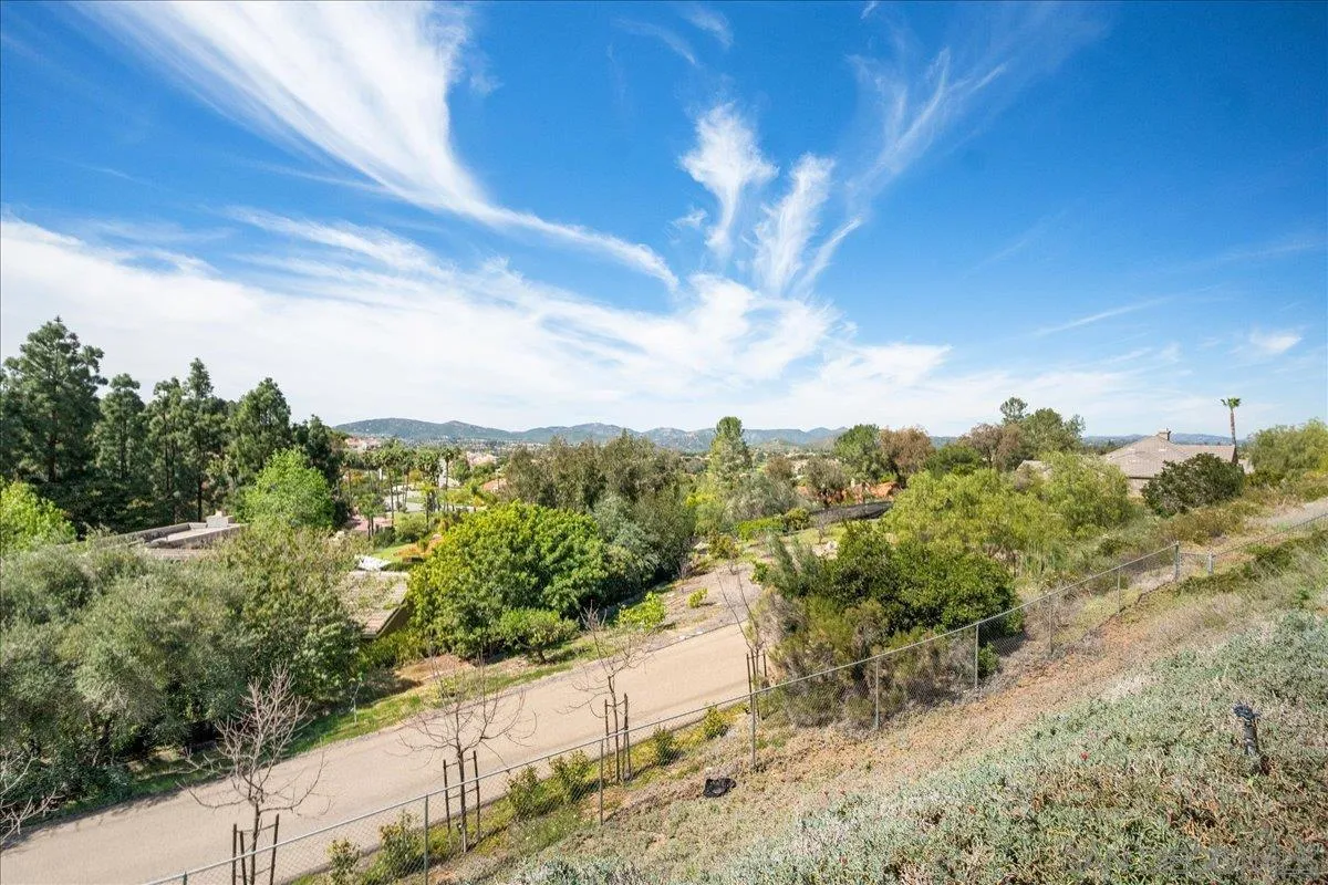 17526 St Andrews Drive Poway, CA 92064 - Photo 2 of 55 a view of a pathway with a yard
