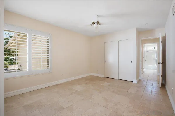 a view of storage and utility room with washer and dryer