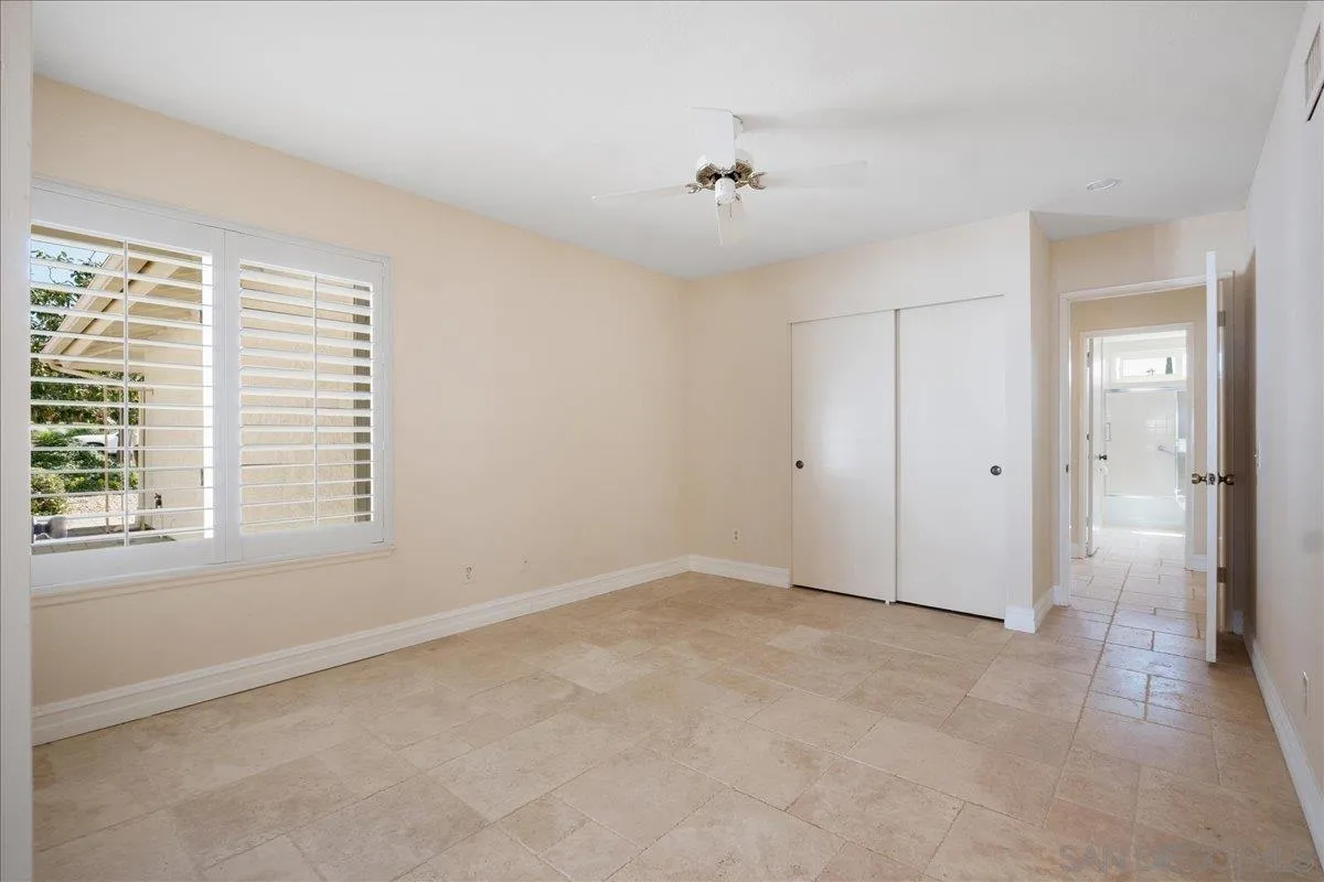 17526 St Andrews Drive Poway, CA 92064 - Photo 34 of 55 a view of an empty room with a window
