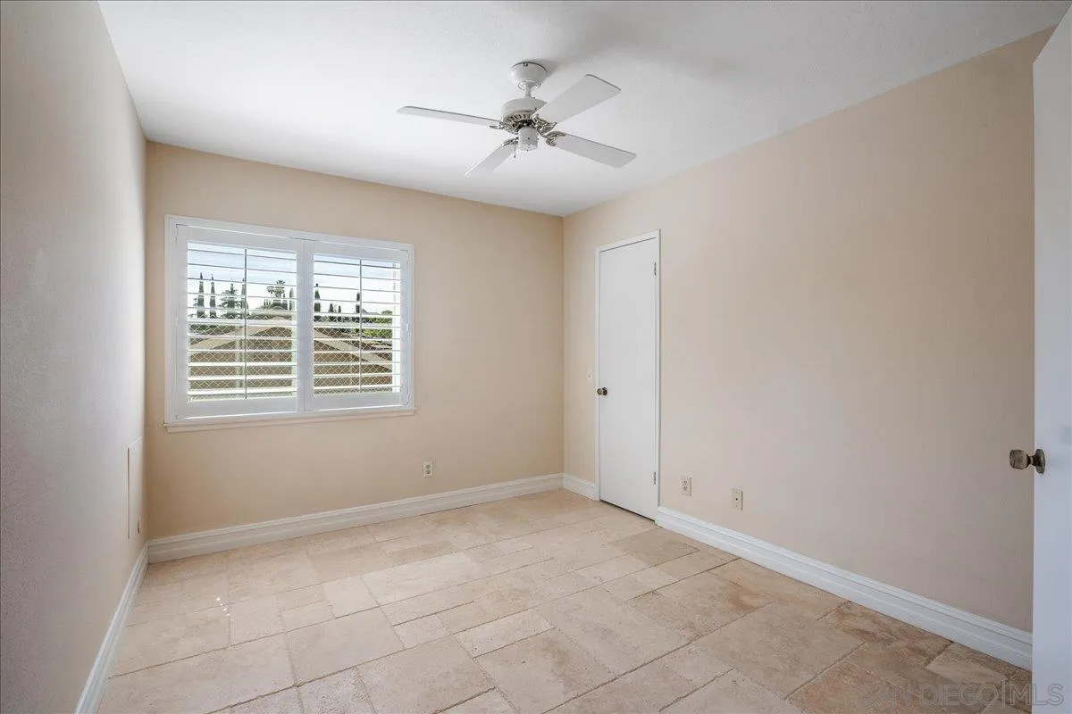 17526 St Andrews Drive Poway, CA 92064 - Photo 36 of 55 a view of a livingroom with a ceiling fan and window