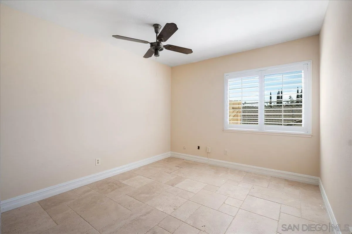 17526 St Andrews Drive Poway, CA 92064 - Photo 38 of 55 a view of room with a ceiling fan and window