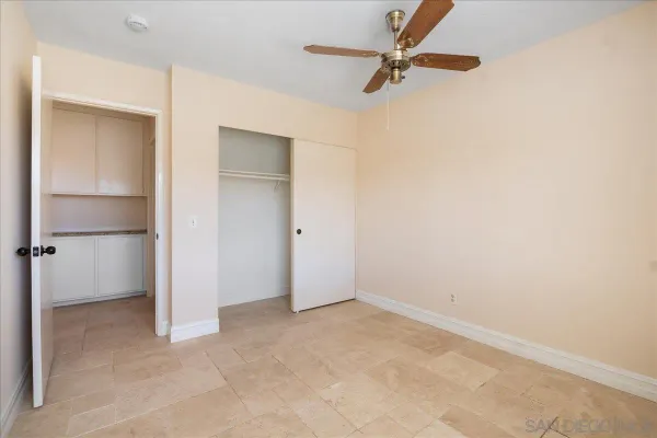 an aerial view of a house with a yard and garden