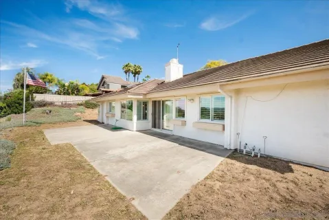 a aerial view of a house with a garden
