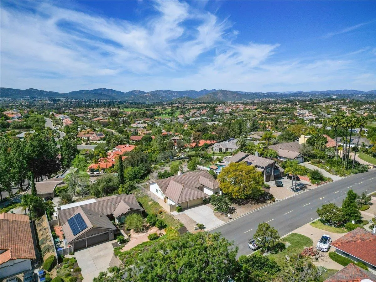 17526 St Andrews Drive Poway, CA 92064 - Photo 50 of 55 an aerial view of residential houses with outdoor space and trees