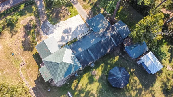 a view of houses with yard