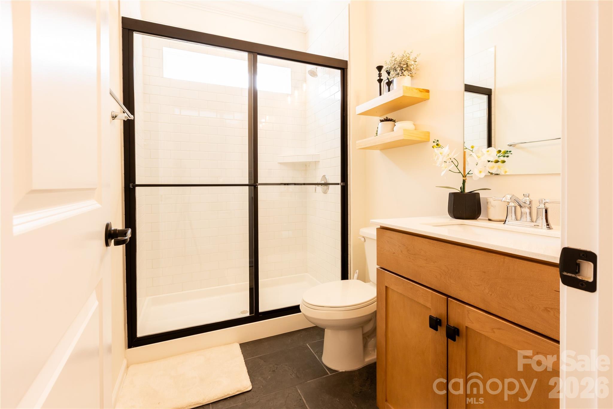 2936 Haley Circle Davidson, NC 28036 - Photo 19 of 45 a bathroom with a shower and a sink