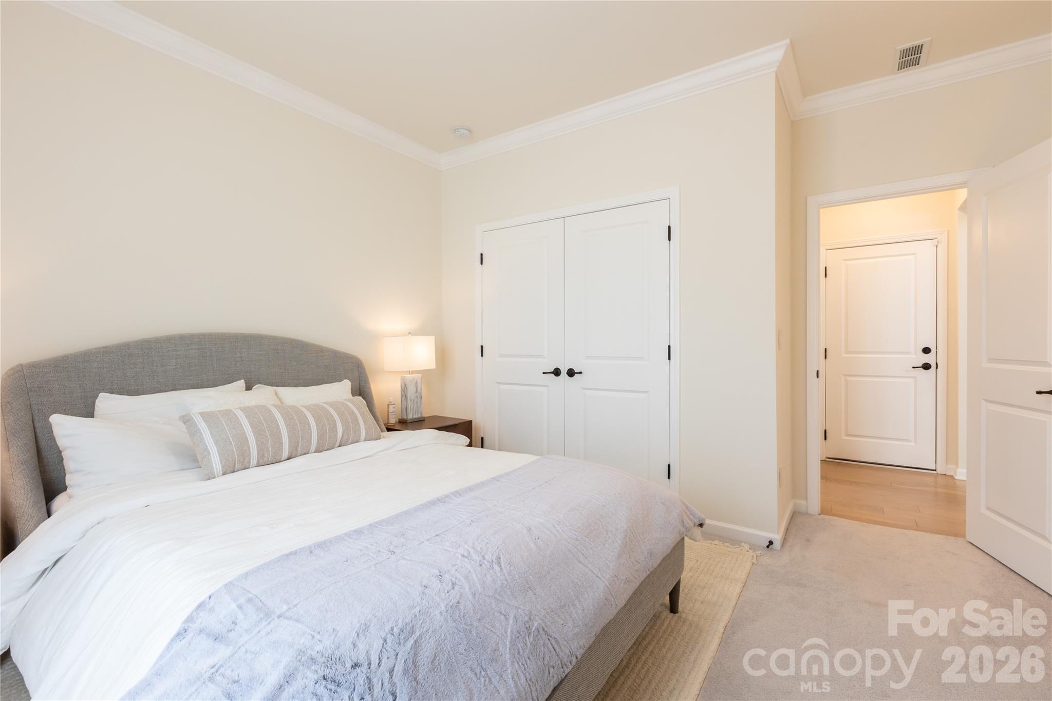 2936 Haley Circle Davidson, NC 28036 - Photo 22 of 45 a bedroom with a bed and a view of bathroom