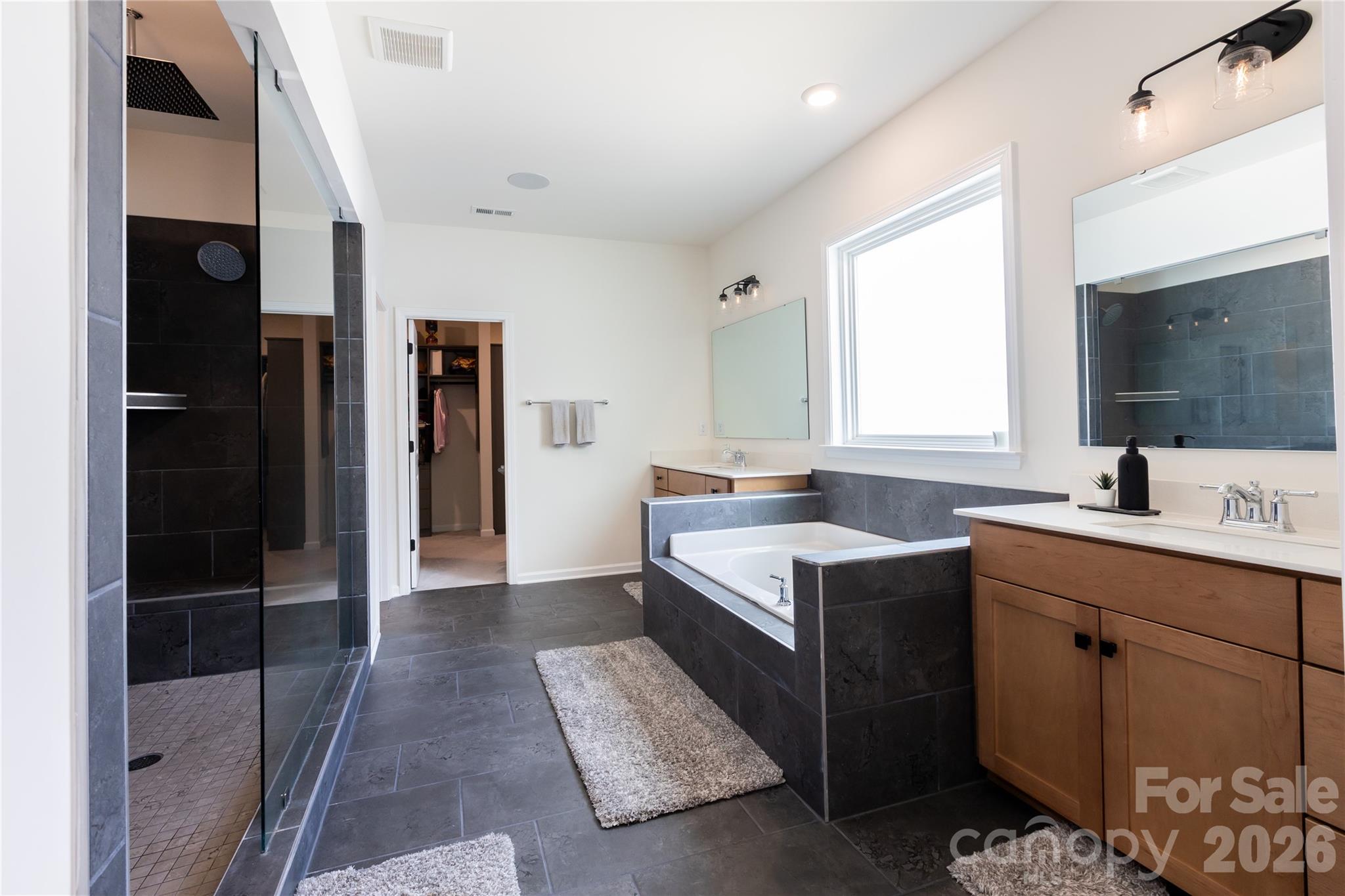 2936 Haley Circle Davidson, NC 28036 - Photo 29 of 45 a kitchen with a sink cabinets and refrigerator