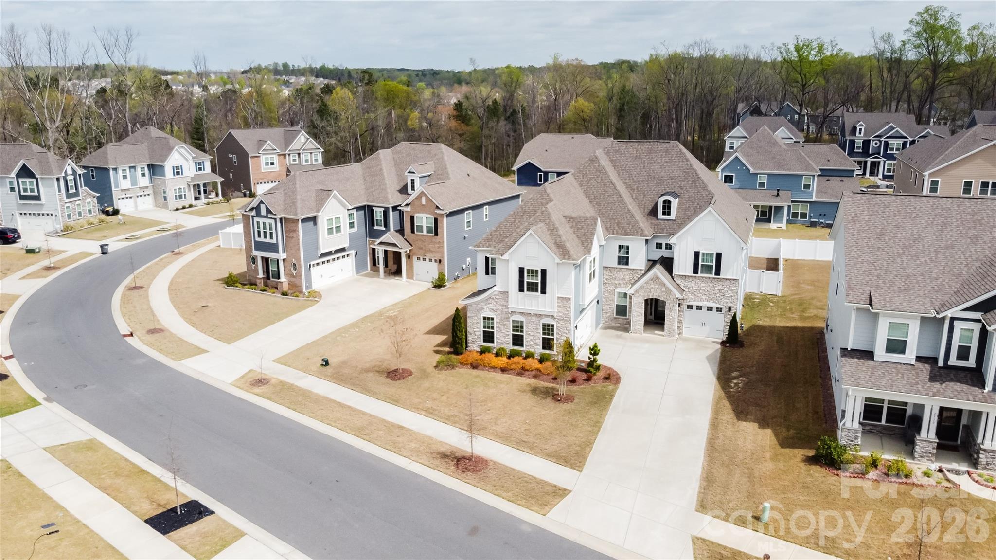 2936 Haley Circle Davidson, NC 28036 - Photo 44 of 45 an aerial view of residential houses with outdoor space and parking