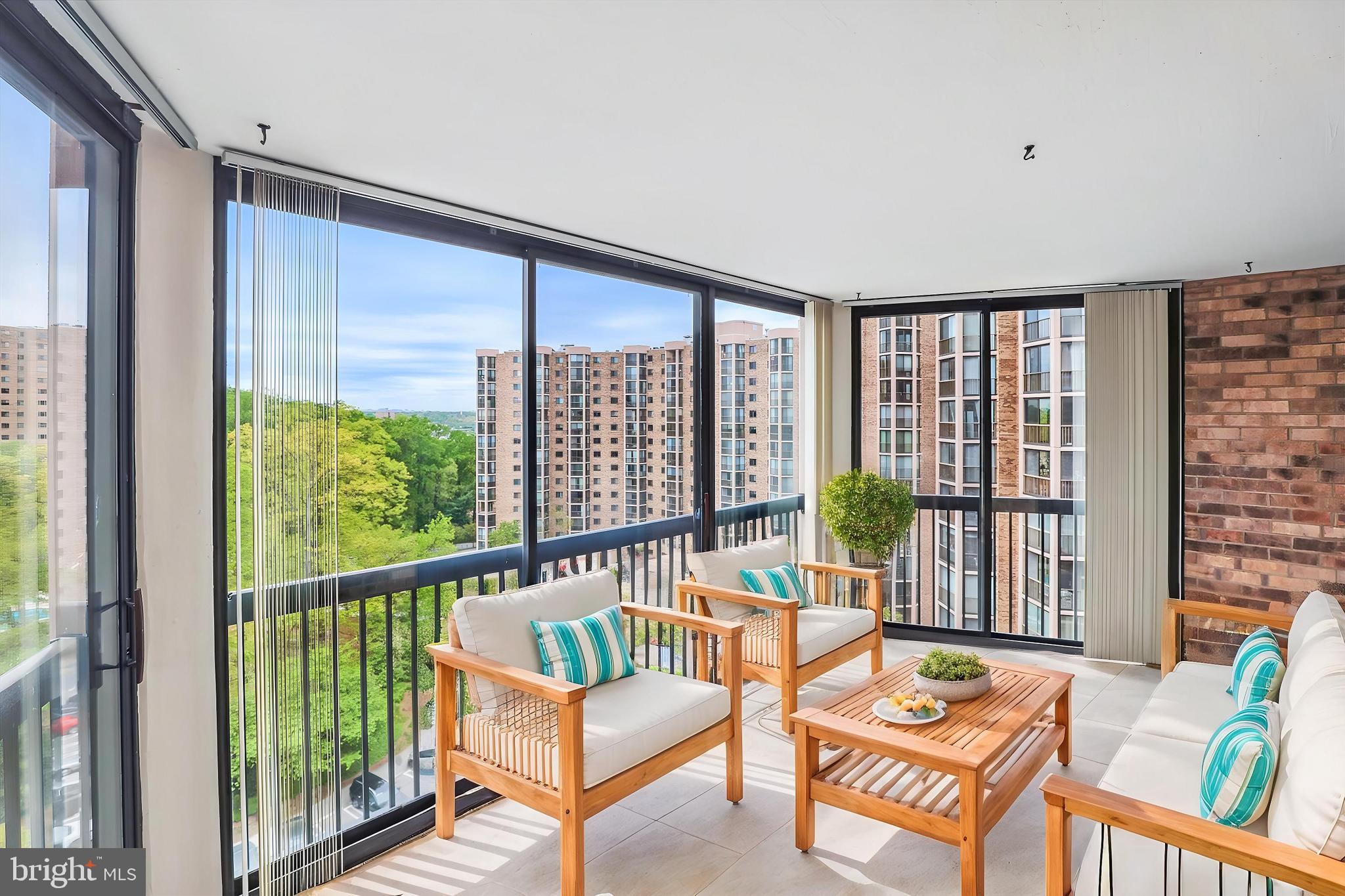 5904 Mt Eagle Drive, Unit 1109 Alexandria, VA 22303 - Photo 1 of 43 a living room with furniture and a window
