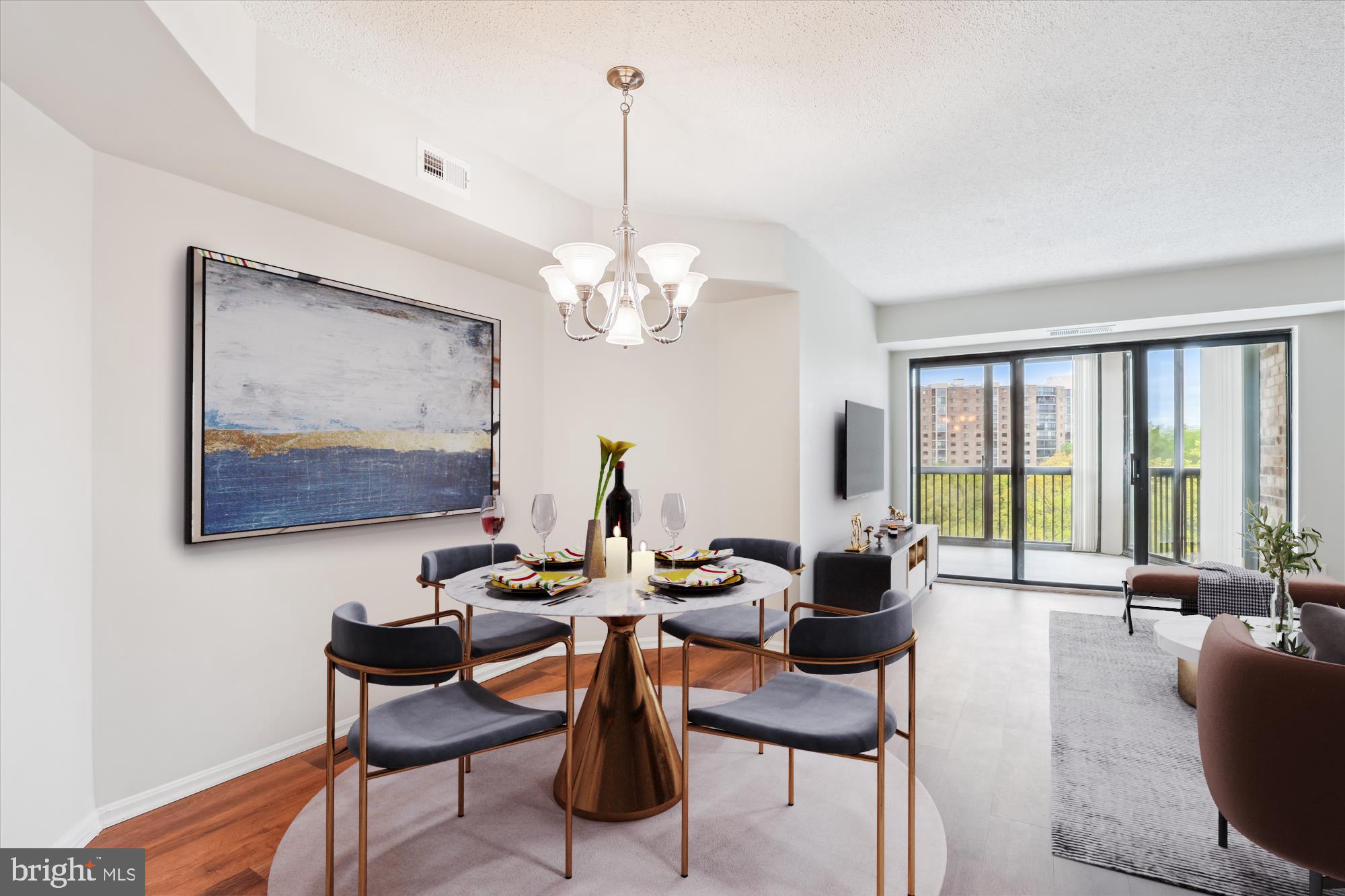 5904 Mt Eagle Drive, Unit 1109 Alexandria, VA 22303 - Photo 2 of 43 a dining room with furniture a large window and wooden floor